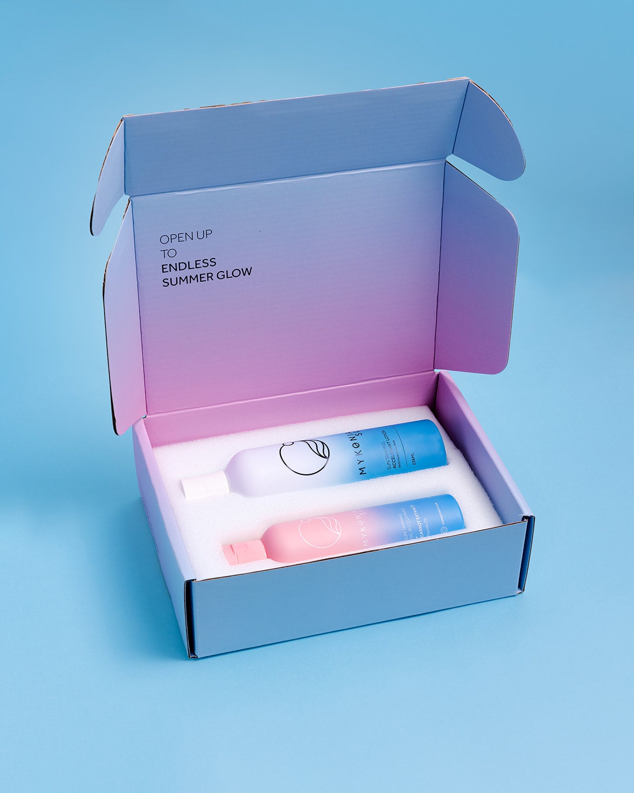 A cardboard box with a set of self tanning products